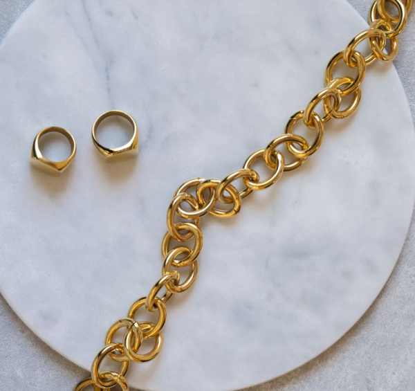 Julia Morgan Fine Jewelry - marble display gold chain and two gold rings